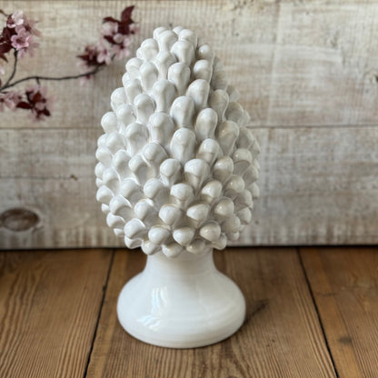 White ceramic pine cone