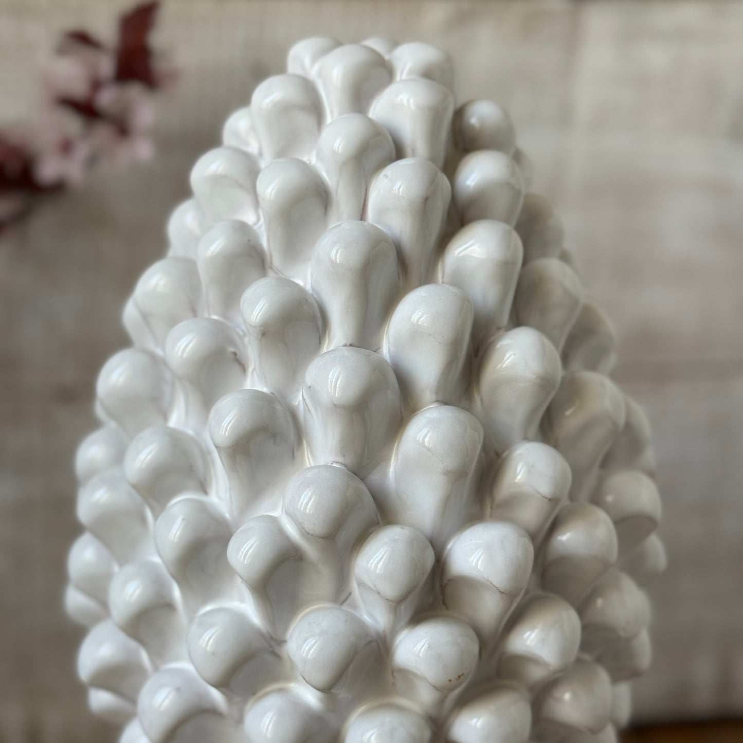 White ceramic pine cone